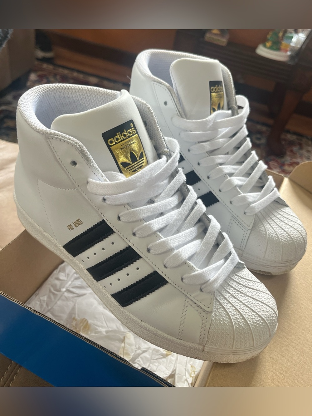 adidas White & Black Men’s Superstar Sneakers with Gold Logo